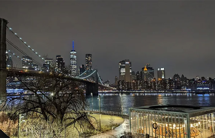 A view of Brooklyn Heights Promenade located in Brooklyn Heights, Brooklyn, NY 11201, known for its skyline vistas, benches, and leisure areas.