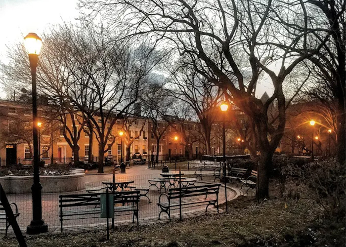 Scenic view of Cobble Hill Park located in Cobble Hill, Brooklyn, NY 11201 / 11231, offering picnic spots, walking paths, and outdoor activities.